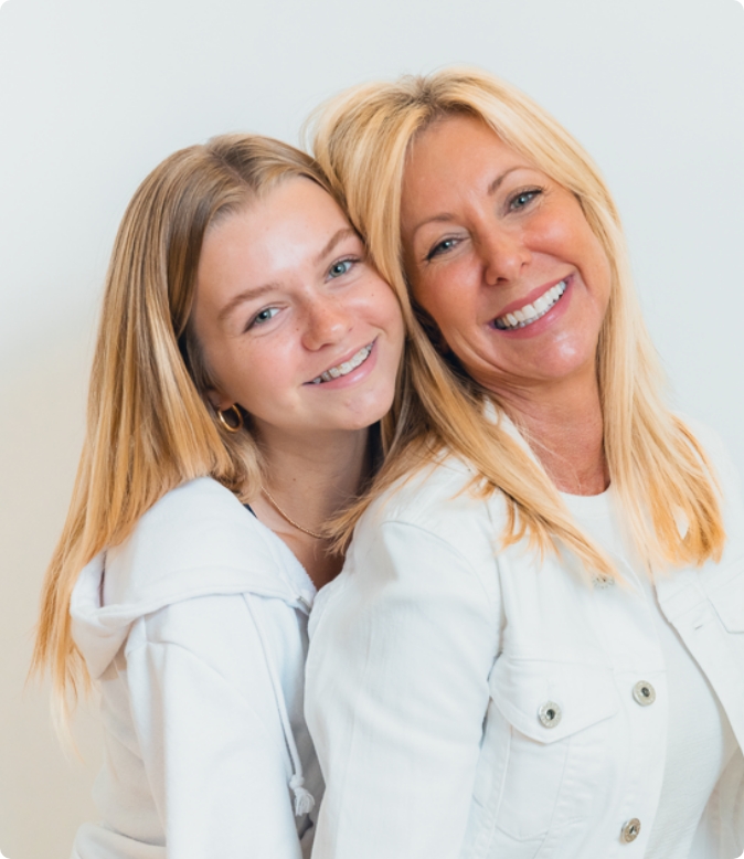 Mother and daughter with clear braces from Moroco Orthodontics Delray Beach
